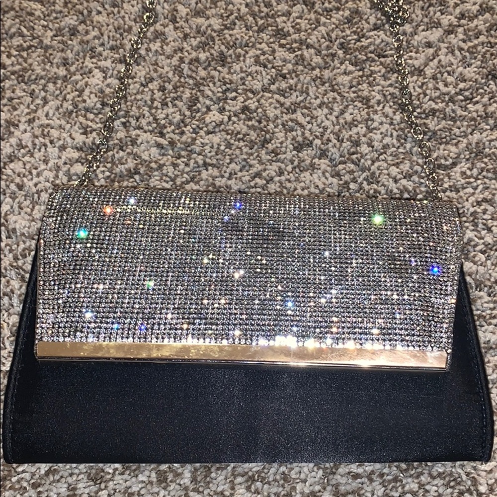 glittery and black over the shoulder mini purse!